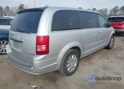 2010 Chrysler Town & Country Lx z USA, uszkodzony, nr VIN 2A4RR4DEXAR133232